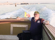 photo of Ted Alper in a boat